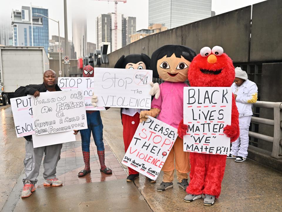 Costumed protestors against gun violence.