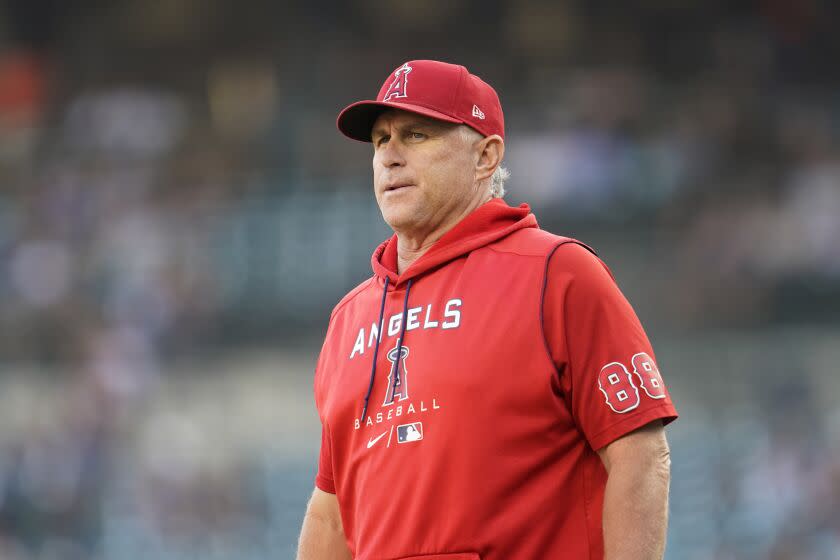 Los Angeles Angels interim manager Phil Nevin watches against the Detroit Tigers