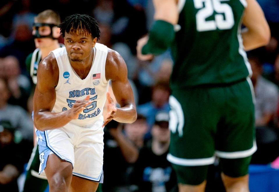 North Carolina’s Harrison Ingram (55) reacts after cutting the Michigan State lead to one point during the first half on Saturday, March 23, 2024, during the second round of the NCAA Tournament at Spectrum Center in Charlotte, N.C.