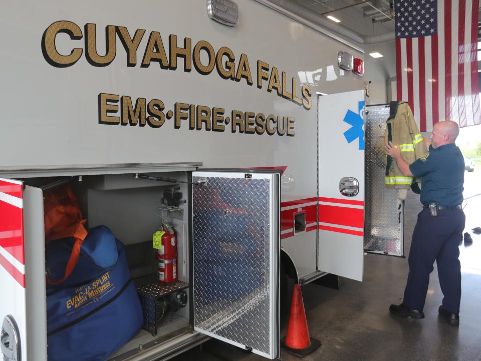 Cuyahoga Falls Fire Lt. Carl Hayward checks the Station No. 3 ambulance after returning from a call. The department recently assigned delegates to work with the city's senior living facilities to address the community's emergency medical needs.