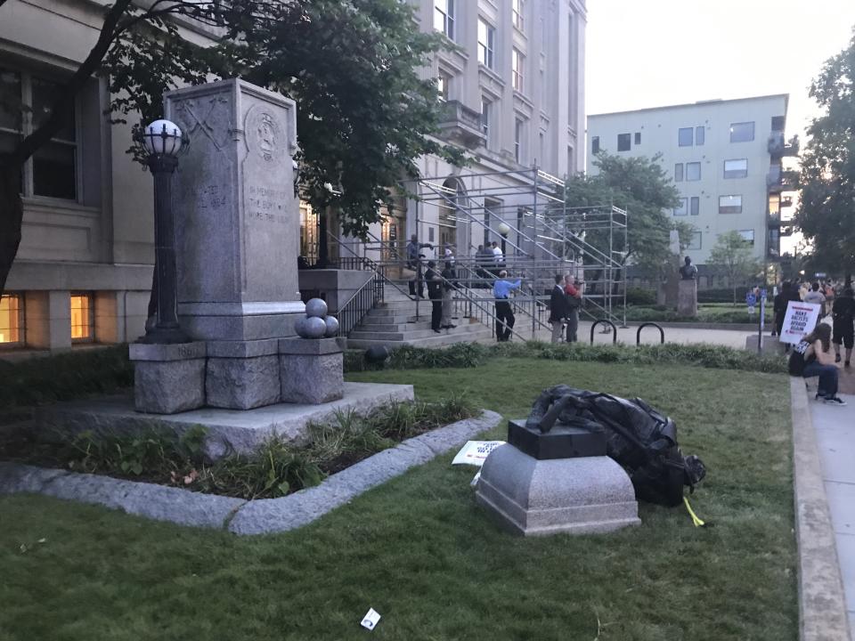 The toppled Confederate monument lies on the grass outside Old Durham County Courthouse. (Photo: Kate Sheppard/HuffPost)