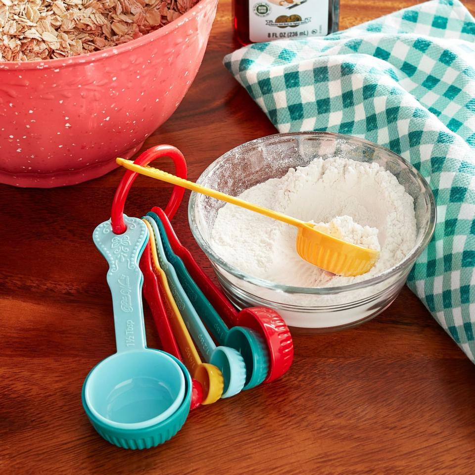 <p><a href="https://go.redirectingat.com?id=74968X1596630&url=https%3A%2F%2Fwww.walmart.com%2Fip%2FThe-Pioneer-Woman-8-Piece-Plastic-Measuring-Spoons-Set%2F479266111%3Fathbdg%3DL1102&sref=https%3A%2F%2F" rel="nofollow noopener" target="_blank" data-ylk="slk:Shop Now;elm:context_link;itc:0;sec:content-canvas" class="link ">Shop Now</a></p><p>The Pioneer Woman 8-Piece Plastic Measuring Spoons Set</p><p>$6.97</p>