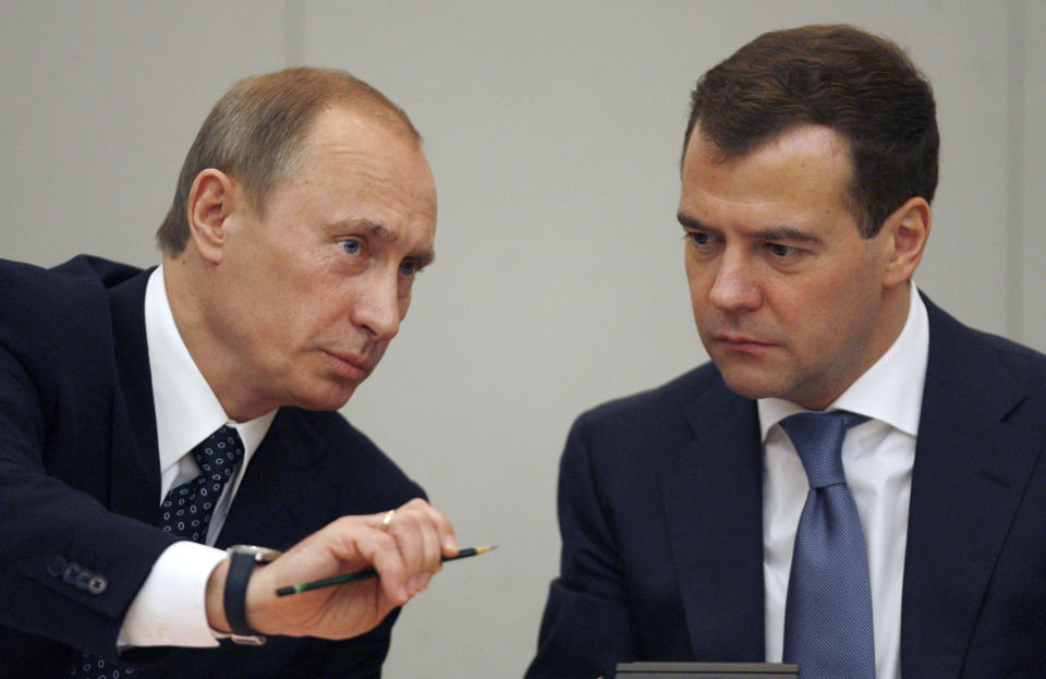 FILE - Russian President Dmitry Medvedev, right, listens to former President Vladimir Putin during a discussion in the State Duma, the lower parliament chamber, in Moscow, May 8, 2008. (AP Photo/ Mikhail Metzel, Pool, File)