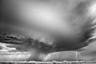 An incredible stormy image claimed the Landscape category, snapped by American Mitch Dobrowner. Dobrowner won the L’Iris d’Or photographer of the year award for his series of images titled 'Storms'.