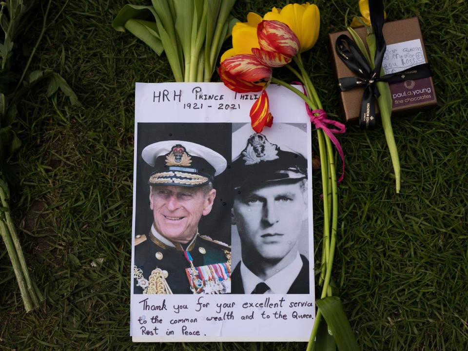 Members of the public leave floral tributes to Prince Philip outside of Windsor Castle (Getty Images)