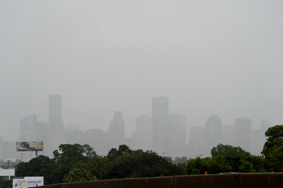 Downtown Houston is cloaked in haze as a Saharan dust cloud moves over parts of Texas on Friday, June 26, 2020. / Credit: David J. Phillip / AP