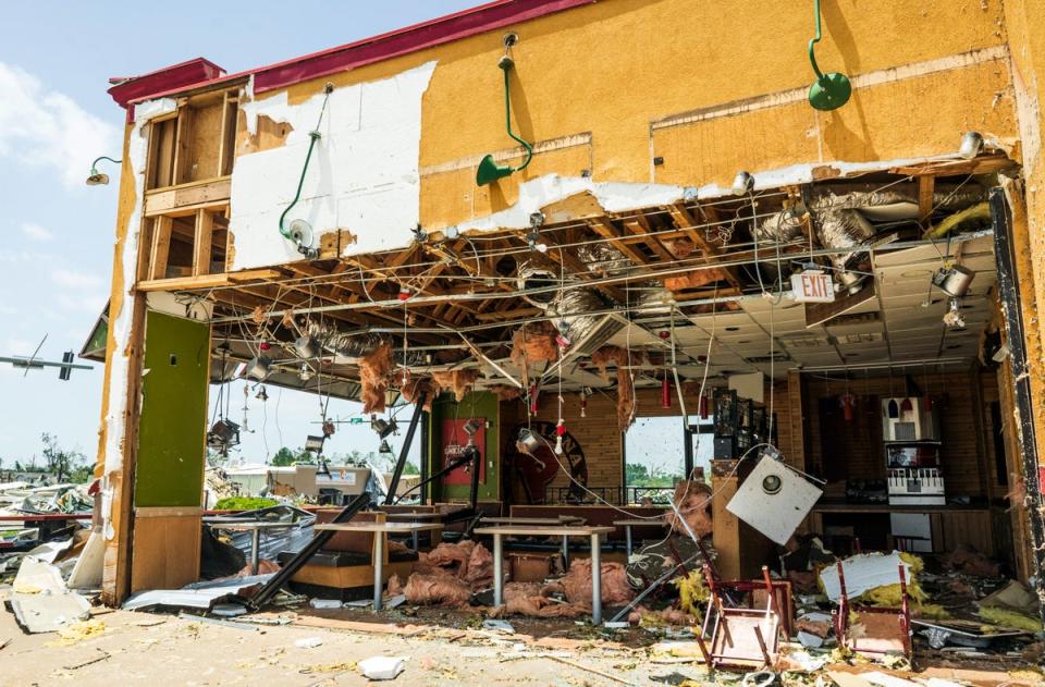 A Popeyes location is damaged from the storm at a shopping mall in Rogers, Arkansas (AP)