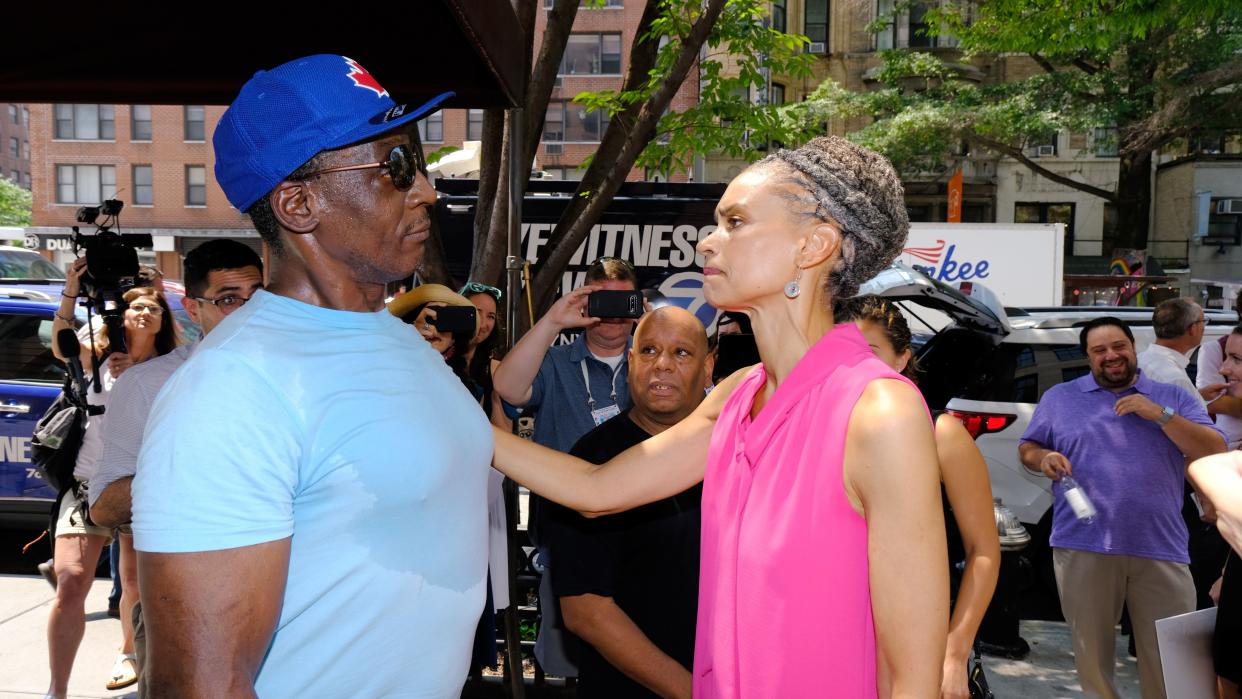 Maya Wiley chats with Anthony Campbell, 50, a homeless man, during the Wednesday media availability outside The Lucerne Hotel on W. 79th Street in Manhattan. 