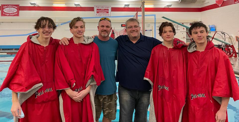 From the left, Palmyra-Macedon's Zach Johnson, Jackson Bay, coach Jeff Anthony, coach Jason Stevens, Connor Jump and Andon Fedor at Thursday's Senior Night meet.