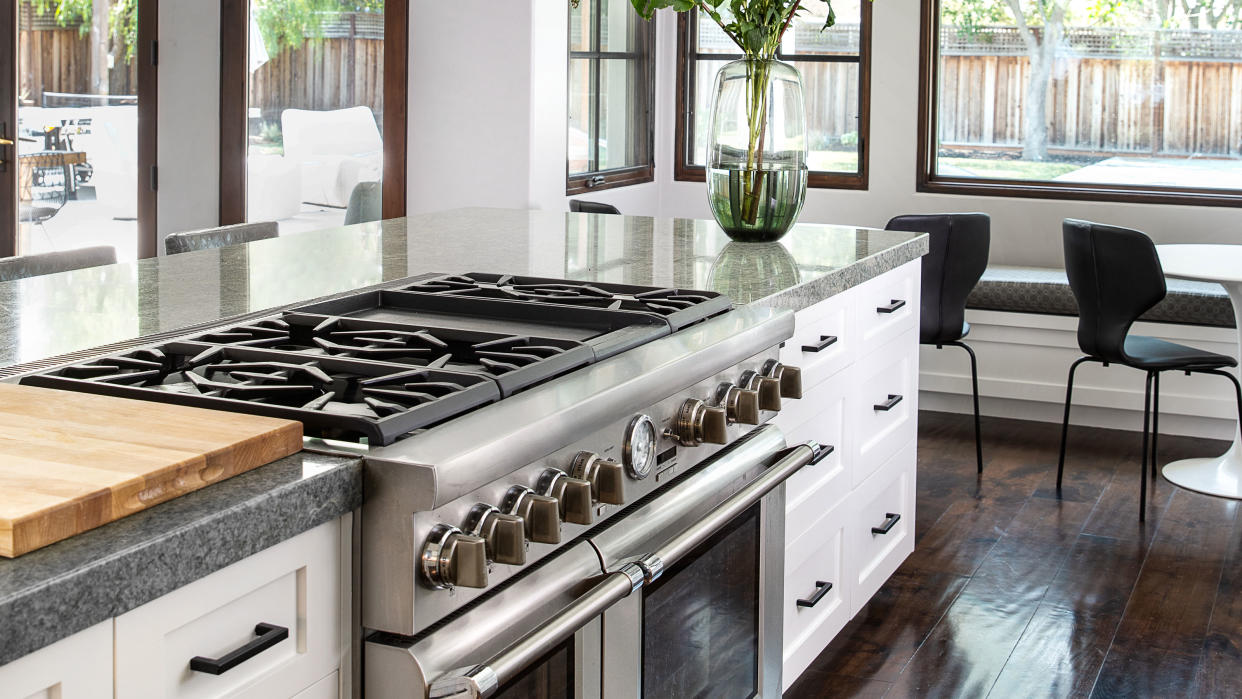  white kitchen with oven and gas stove 