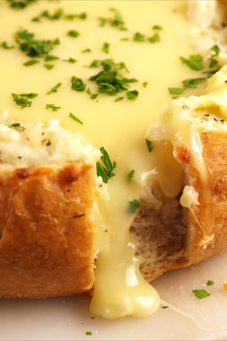 <p>The ULTIMATE cheesy bread.</p><p>Get the recipe from <a href="https://www.delish.com/cooking/recipe-ideas/recipes/a56271/bloomin-brie-bread-recipe/" rel="nofollow noopener" target="_blank" data-ylk="slk:Delish;elm:context_link;itc:0;sec:content-canvas" class="link ">Delish</a>. </p>