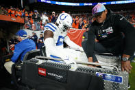 Indianapolis Colts defensive end Kwity Paye (51) is carted off the field after an injury against the Denver Broncos during the second half of an NFL football game, Thursday, Oct. 6, 2022, in Denver. (AP Photo/Jack Dempsey)