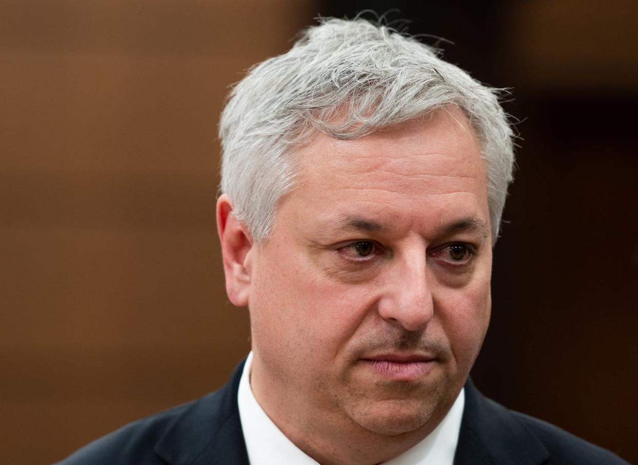 Director of the Canadian Security Intelligence Service (CSIS) David Vigneault waits to appear before the special committee on the Canada-People's Republic of China relationship (CACN) on Parliament Hill in Ottawa on Monday, Feb. 6, 2023. (Spencer Colby/Canadian Press - image credit)