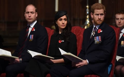 The Duke of Cambridge, Meghan Markle and Prince Harry during the Anzac Day service - Credit: Eddie Mulholland/The Telegraph