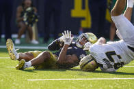 Notre Dame safety Kyle Hamilton (14) intercepts a pass in the end zone intended for Purdue tight end Payne Durham (87) during the second half of an NCAA college football game in South Bend, Ind., Saturday, Sept. 18, 2021. Notre Dame defeated Purdue 27-13. (AP Photo/Michael Conroy)