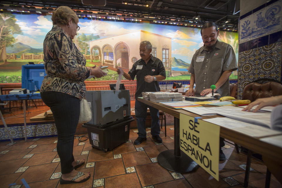 Latinos vote at a polling station in El Gallo, a Los Angeles restaurant, in 2016.