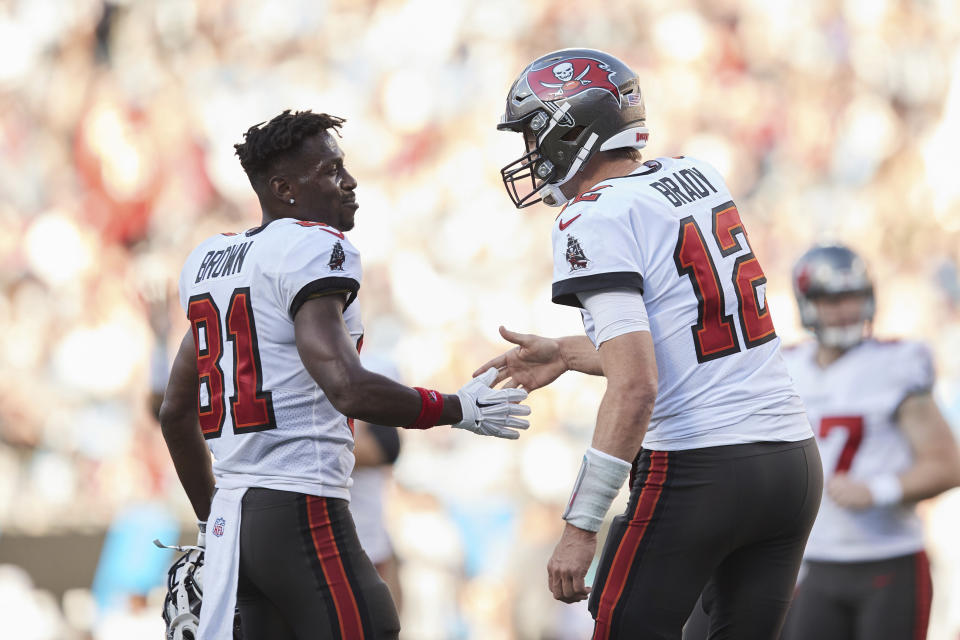 Tom Brady struck an empathetic tone for Antonio Brown after Sunday's bizarre scene, perhaps because he's had teammates who've battled major issues before. (AP Photo/Brian Westerholt)