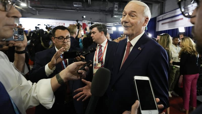 Former Arkansas Gov. Asa Hutchinson speaks to reporters in the spin room after a Republican presidential primary debate hosted by FOX News Channel Wednesday, Aug. 23, 2023, in Milwaukee.