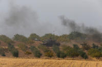 A Turkish army tank drives towards to the border in Karkamis on the Turkish-Syrian border in the southeastern Gaziantep province, Turkey, August 25, 2016. REUTERS/Umit Bektas