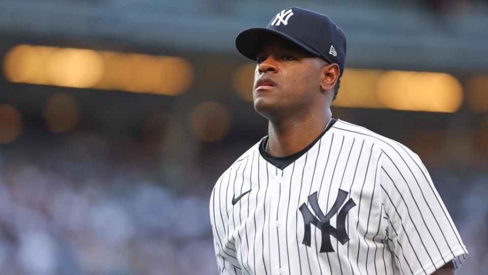 Jul 13, 2022;  Bronx, New York, USA;  New York Yankees starting pitcher Luis Severino (40) walks off the field after the second inning against the Cincinnati Reds at Yankee Stadium.