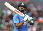 India's captain Virat Kohli reacts as he leaves the field after being dismissed during the Cricket World Cup match between India and Pakistan at Old Trafford in Manchester, England, Sunday, June 16, 2019. (AP Photo/Aijaz Rahi)