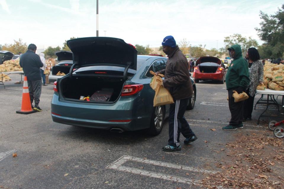 The Long Foundation Inc. and partners hosted their annual Strike Out Hunger food giveaway for hundreds of people on Thursday in the Oaks Mall parking lot.