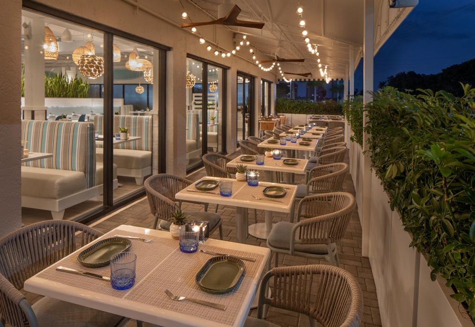 A view of AquaGrille's patio and main dining room in Juno Beach.