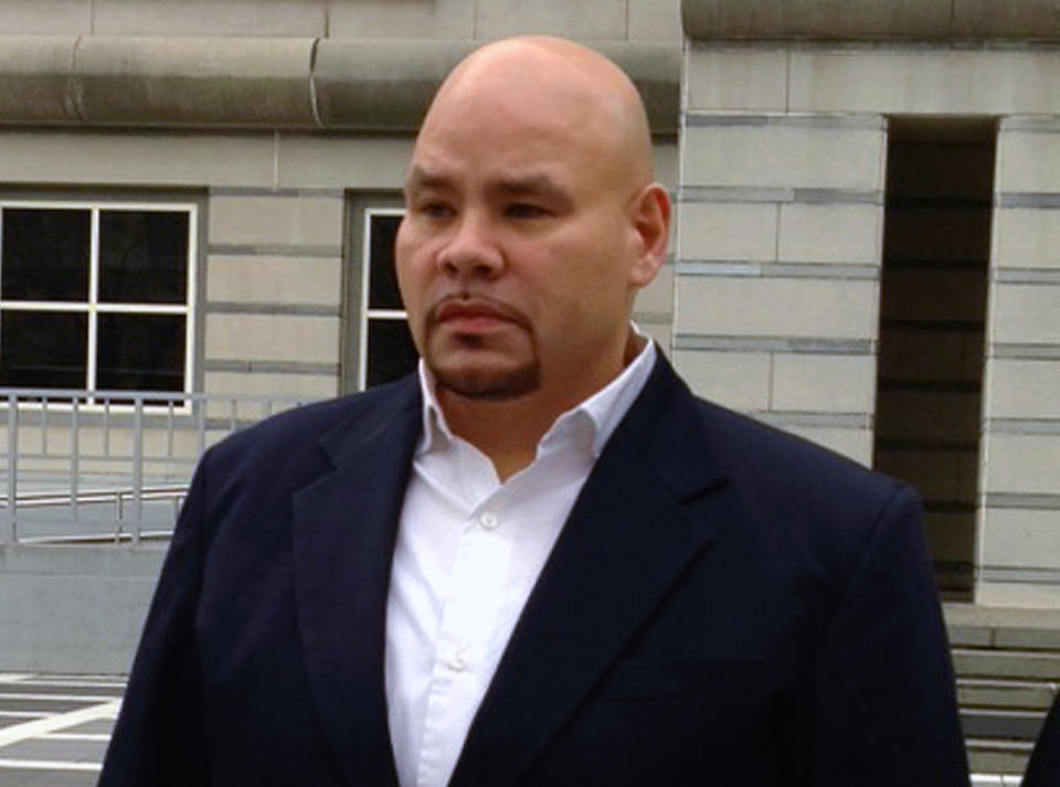 FILE - This Dec. 20, 2012 file photo shows rapper Fat Joe, whose real name is Joseph Cartagena, leaving court in Newark N.J. Cartagena is being sentenced sentenced Monday, June 24, in federal court after he pleaded guilty in December 2012 to failing to pay taxes on more than $1 million of income in 2007 and in 2008. The Miami Beach resident was prosecuted in New Jersey because some of the companies he earns money from are incorporated in Somerville. (AP Photo/Samantha Henry, file)