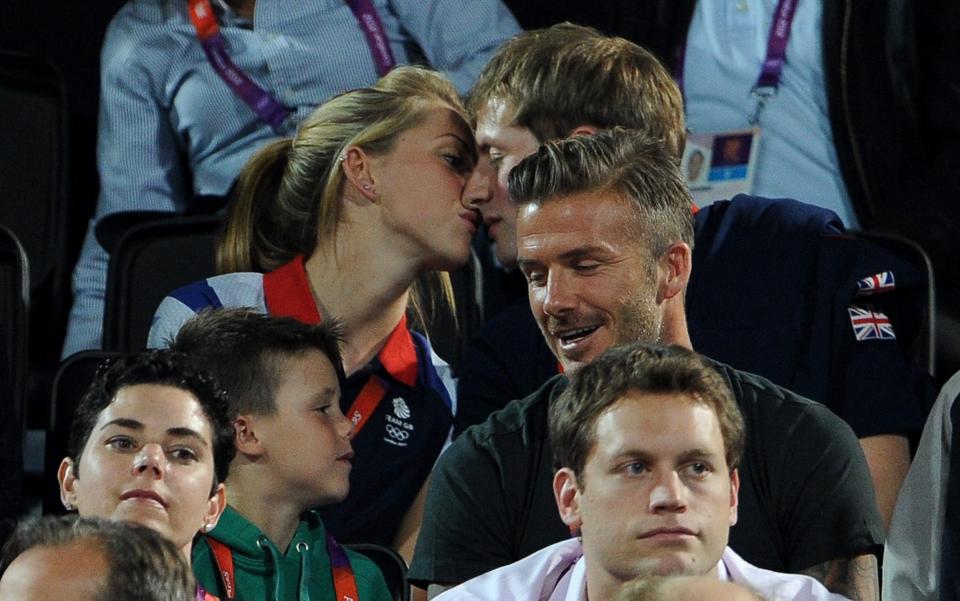 British cyclists Laura Trott and Jason Kenny kissing at London 2012