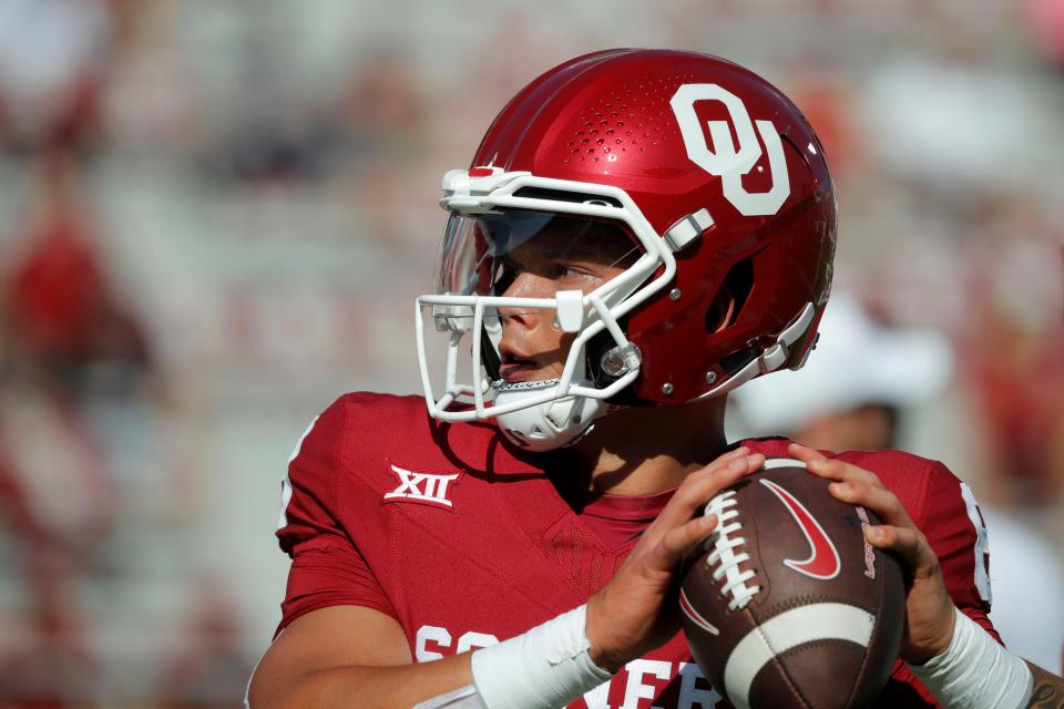 Oklahoma's Dillon Gabriel (8) warms up before a college football game between the University of Oklahoma Sooners (OU) and the Arkansas State Red Wolves at Gaylord Family-Oklahoma Memorial Stadium in Norman, Okla., Saturday, Sept. 2, 2023.