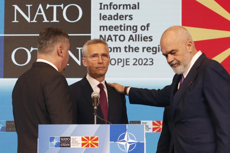 From left, Croatia's President Zoran Milanovic, NATO Secretary General Jens Stoltenberg and Albania's Prime Minister Edi Rama share a word after their meeting, in Skopje, North Macedonia, on Wednesday, Nov. 22, 2023. (AP Photo/Boris Grdanoski)