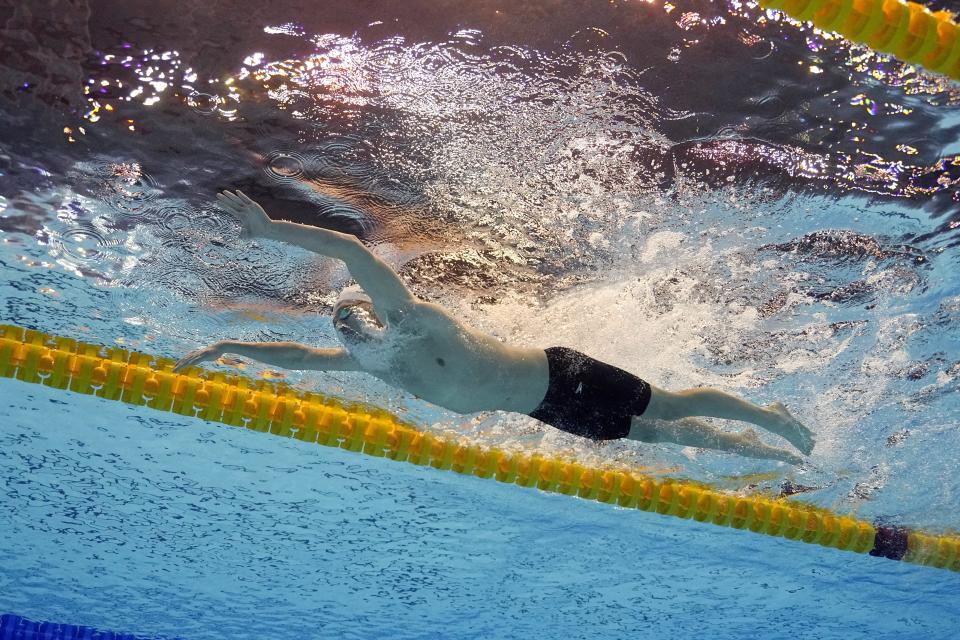 Leon Marchand, of France, competes in the men's 400m individual medley final at the World Swimming Championships in Fukuoka, Japan, Sunday, July 23, 2023. Marchand set a new world record winning gold. (AP Photo/David J. Phillip)