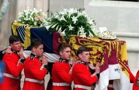 LONDON - 1997: (FILE PHOTO) The Princess of Wales' coffin is carried from Westminster Abbey after the funeral service, 6th September 1997. The card on the top is from Princes William and Harry and addressed to 'mummy'. (Photo by Jayne Fincher/Getty Images) On July 1st Diana, Princess Of Wales would have celebrated her 50th Birthday Please refer to the following profile on Getty Images Archival for further imagery. http://www.gettyimages.co.uk/Search/Search.aspx?EventId=107811125&EditorialProduct=Archival For further images see also: Princess Diana: http://www.gettyimages.co.uk/Account/MediaBin/LightboxDetail.aspx?Id=17267941&MediaBinUserId=5317233 Following Diana's Death: http://www.gettyimages.co.uk/Account/MediaBin/LightboxDetail.aspx?Id=18894787&MediaBinUserId=5317233 Princess Diana - A Style Icon: http://www.gettyimages.co.uk/Account/MediaBin/LightboxDetail.aspx?Id=18253159&MediaBinUserId=5317233