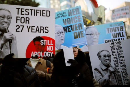 People hold up banners during the funeral of a former South Korean "comfort woman" Kim Bok-dong in Seoul, South Korea, February 1, 2019. REUTERS/Kim Hong-Ji