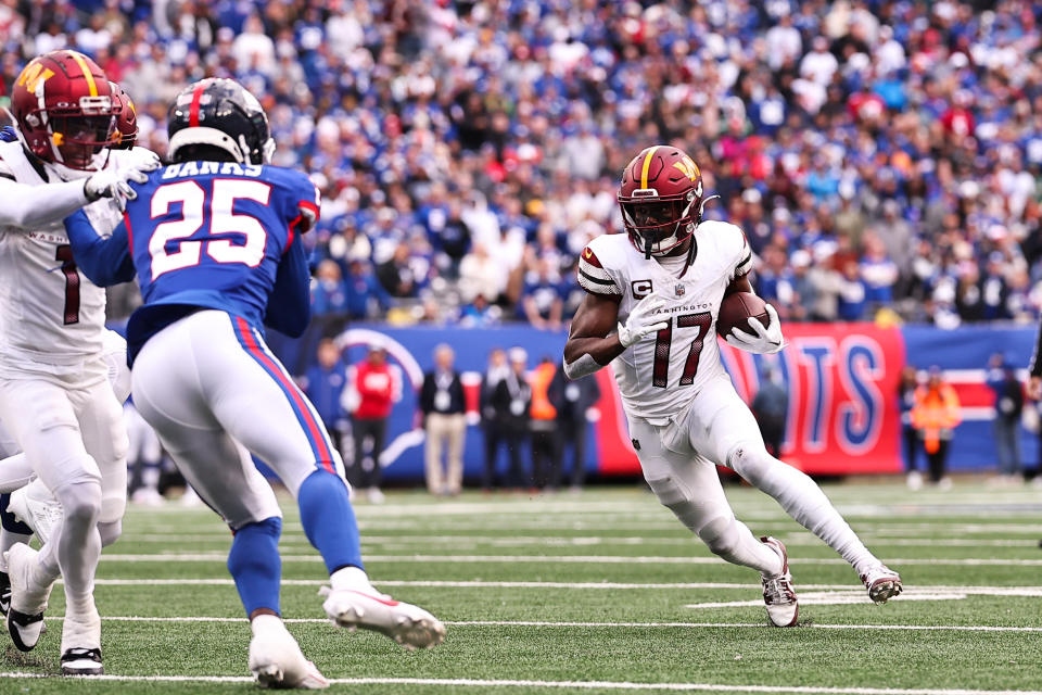 Terry McLaurin #17 of the Washington Commanders runs with the ball during the fourth quarter of the game against the New York Giants. (Photo by Dustin Satloff/Getty Images)