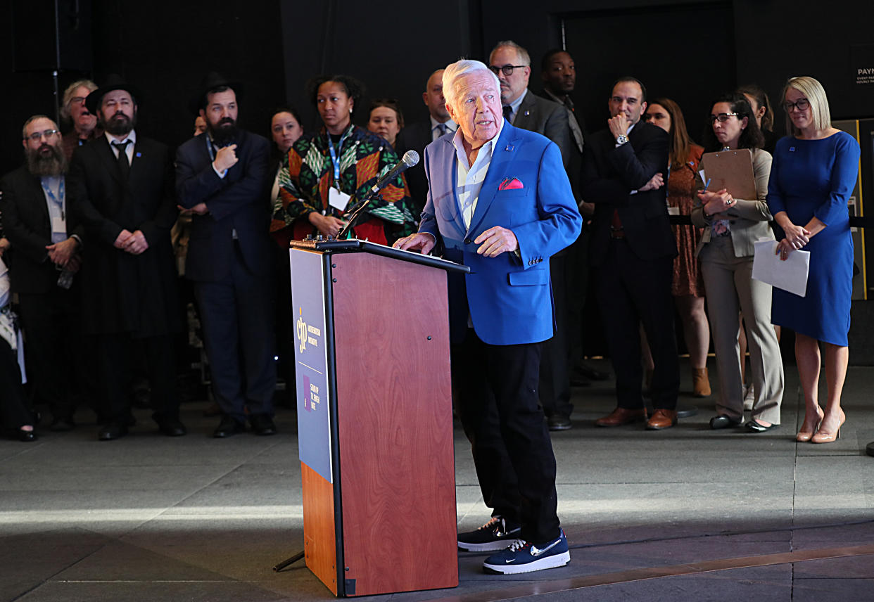 Boston, MA - May 15: New England Patriots owner Robert Kraft, at podium, along side Combined Jewish Philanthropies of Greater Boston, Governor Maura Healey, Attorney General Andrea Campbell,  Boston Mayor Michelle Wu, and other community representatives, announced the new Face Jewish Hate campaign outside North Station. Combined Jewish Philanthropies of Greater Boston (CJP) unveiled  a new issues advocacy campaign, Face Jewish Hate, to raise public awareness against an alarming rise in antisemitism. (Photo by Suzanne Kreiter/The Boston Globe via Getty Images)