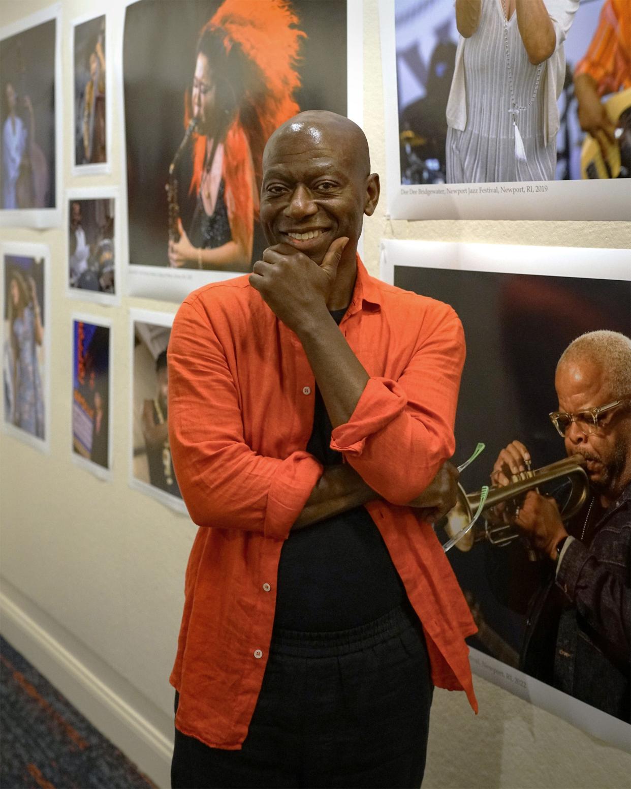 Kofi Poku stands in the Harold Stevens Gallery at  WCUW 91.3 Community Radio, where his photographs of jazz musicians will be exhibited.