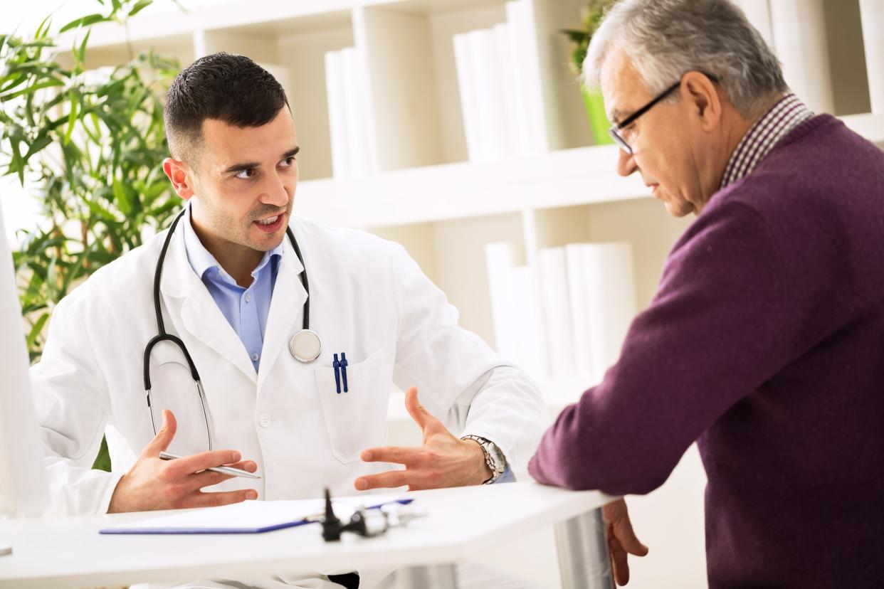 doctor explains to sick patient about healthy