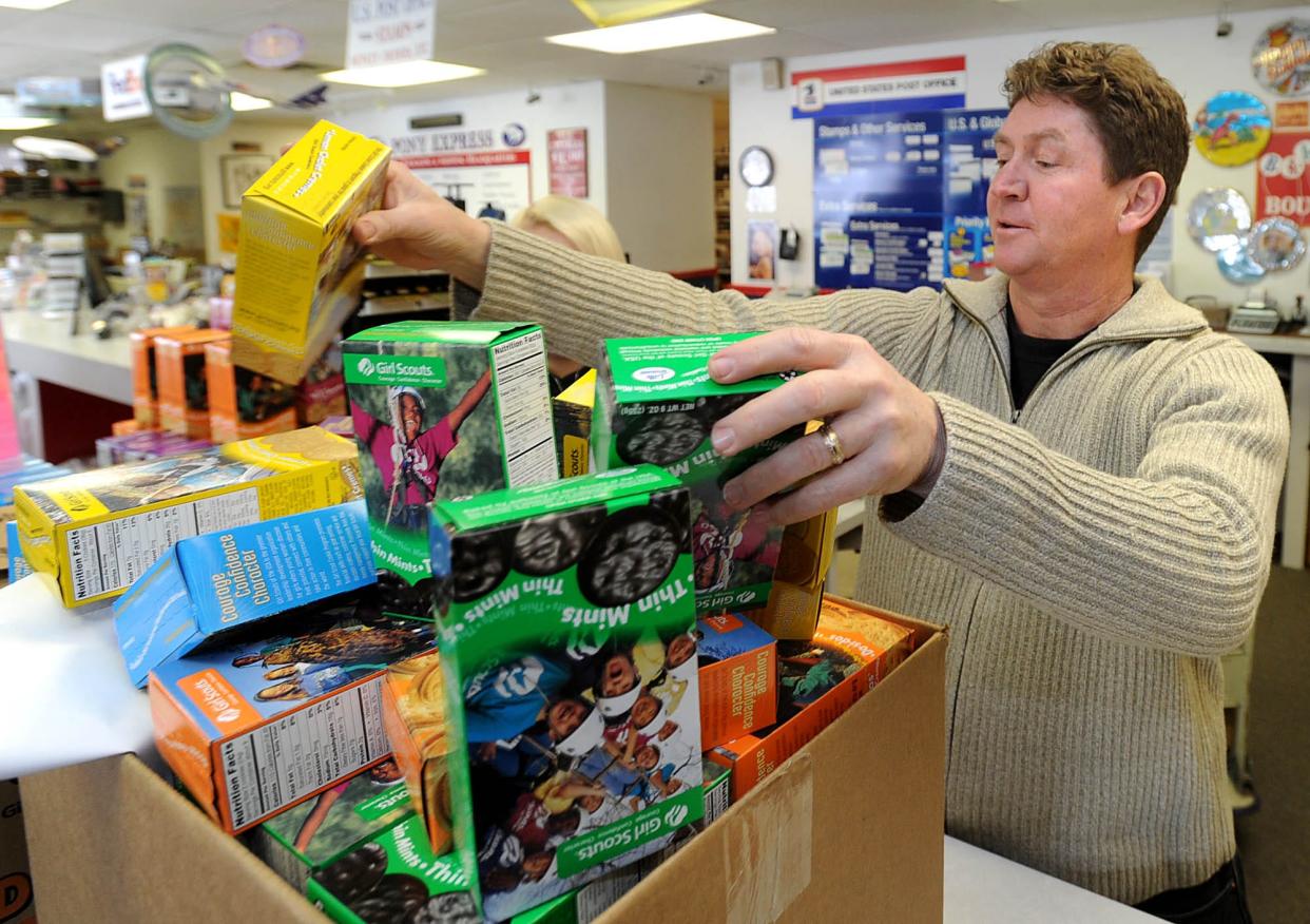 Dave Grab, owner of Pony Express, in Erie, packed 700 boxes of Girl Scout cookies in 2011, part of an effort with the Pittsburgh Inn to send Girl Scout cookies to local troops in Iraq and Afghanistan. He still ships cookies to troops, 13 years later.