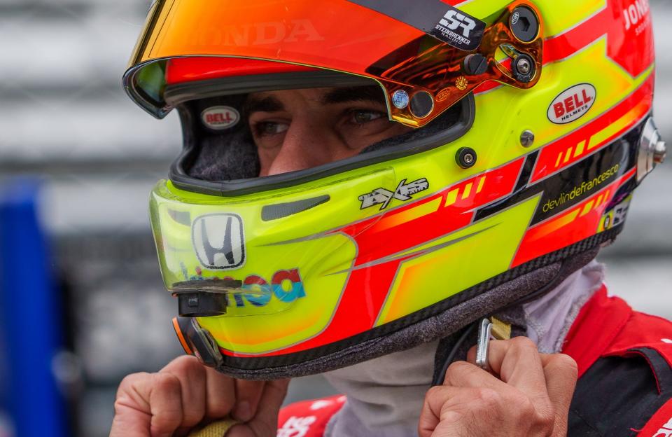 Andretti Steinbrenner Autosport driver Devlin DeFrancesco (29) straps on his helmet Wednesday, April 20, 2022, prior to the start of open test practice in preparation for the 106th running of the Indianapolis 500. 