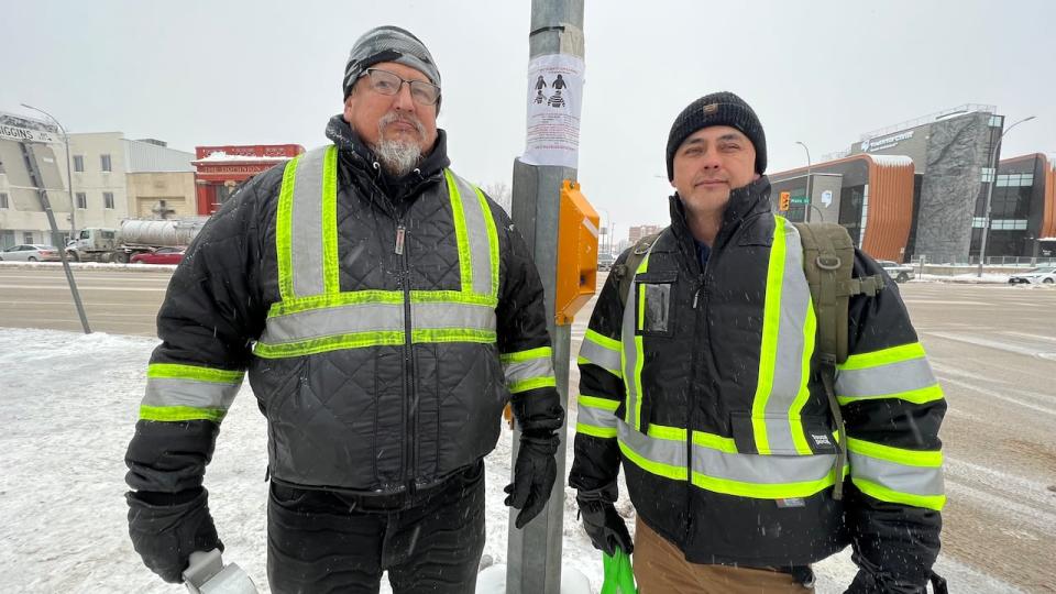 Darryl Contois and George Robinson spent New Year's Day morning speaking to people in search of information that might help police identify Buffalo Woman, who police say they believe was Jeremy Skibicki's fourth victim.