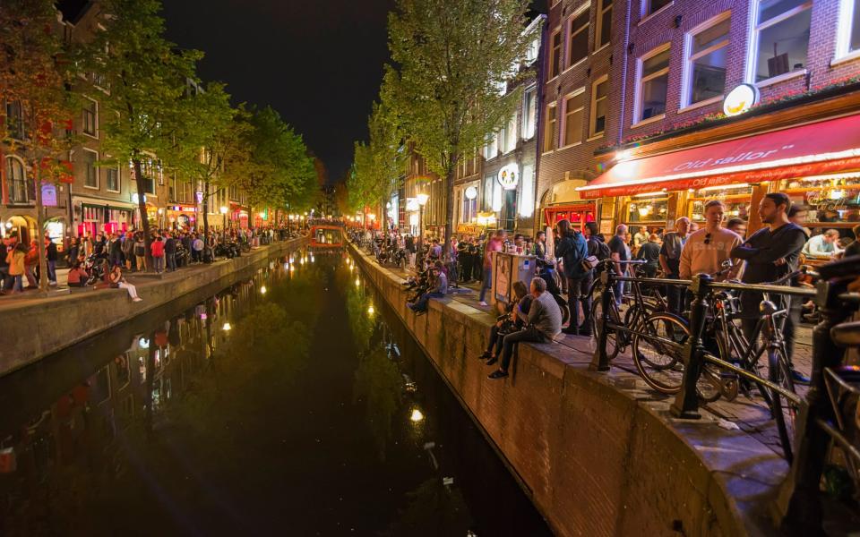 Amsterdammers have had enough of the anti-social behaviour of tourists visiting the Red Light District  - iStock