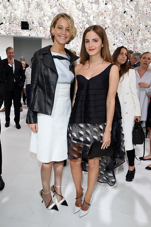 Jennifer Lawrence face palms Emma Watson at the Dior couture show.