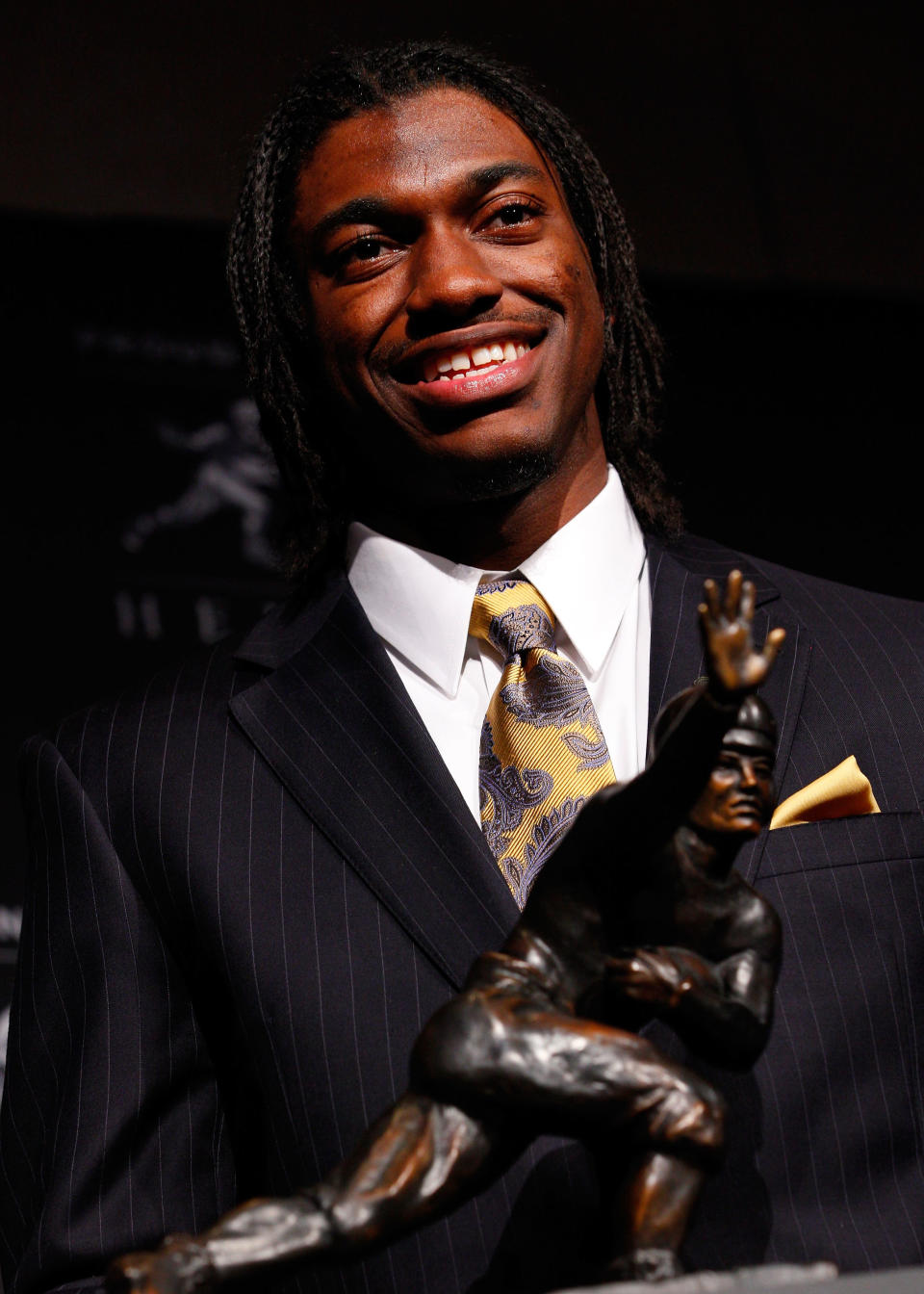 NEW YORK, NY - DECEMBER 10: Robert Griffin III of the Baylor Bears poses with the trophy after being named the 77th Heisman Memorial Trophy Award winner during a press conference at The New York Marriott Marquis on December 10, 2011 in New York City. (Photo by Jeff Zelevansky/Getty Images)