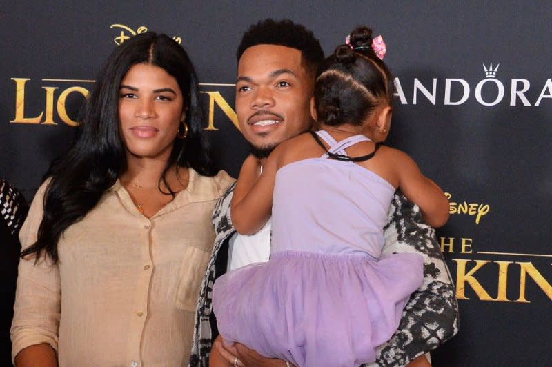 Chance the Rapper (C) and his wife, Kirsten Corley, will "part ways" after previously separating. File Photo by Jim Ruymen/UPI