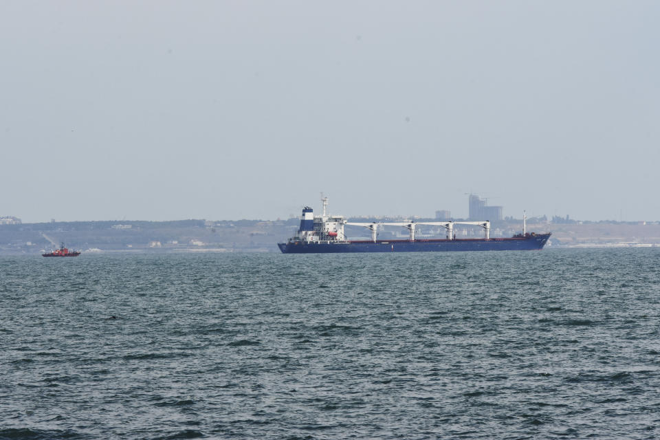 The bulk carrier Razoni starts its way from the port in Odesa, Ukraine, Monday, Aug. 1, 2022. According to Ukraine's Ministry of Infrastructure, the ship under Sierra Leone's flag is carrying 26 thousand tons of Ukrainian corn to Lebanon. The first ship carrying Ukrainian grain set off from the port of Odesa on Monday under an internationally brokered deal and is expected to reach Istanbul on Tuesday, where it will be inspected, before being allowed to proceed. (AP Photo/Michael Shtekel)