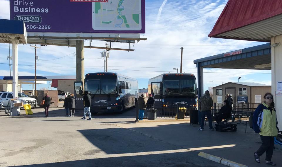 Stranded passengers await a new driver at the Greyhound bus station on State Highway 351.