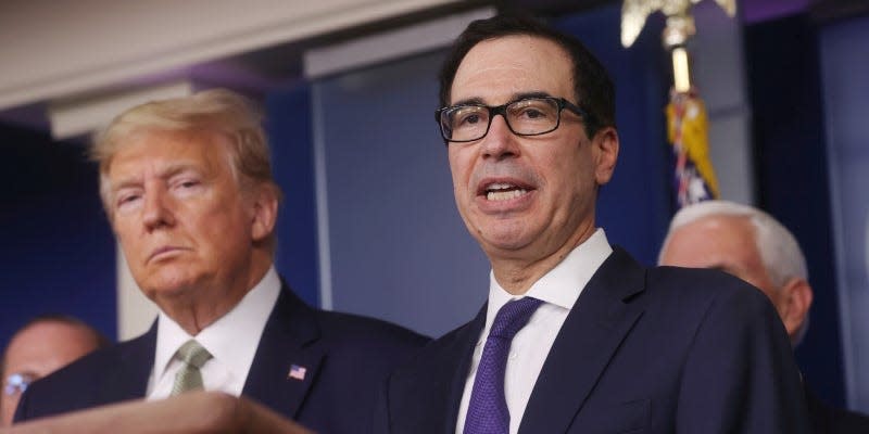 FILE PHOTO: U.S. President Donald Trump and Treasury Secretary Steven Mnuchin answer questions during the Trump administration?s daily coronavirus briefing at the White House in Washington, U.S., March 17, 2020. REUTERS/Jonathan Ernst/File Photo