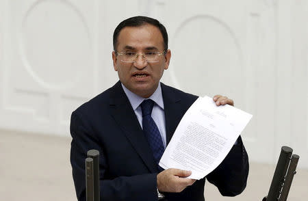 FILE PHOTO: Justice Minister Bekir Bozdag addresses the Turkish Parliament during a debate in Ankara in this March 19, 2014. REUTERS/Umit Bektas/File