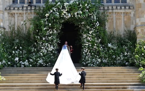 In a dramatic departure from both English and American custom, the bride started her walk down the aisle, alone - Credit: Ben Birchall/PA Wire